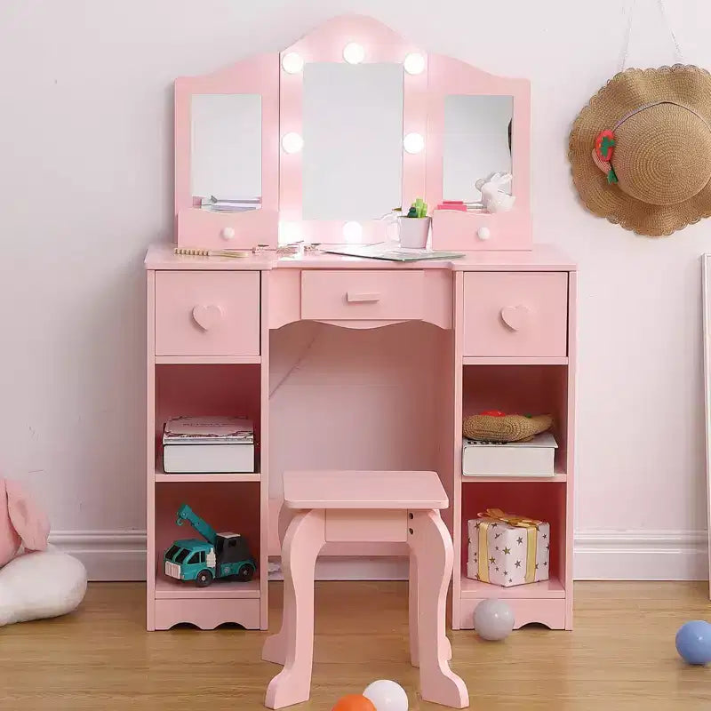 Coiffeuse pour enfants avec miroir triptyque, comprenant une coiffeuse et un tabouret en bois.